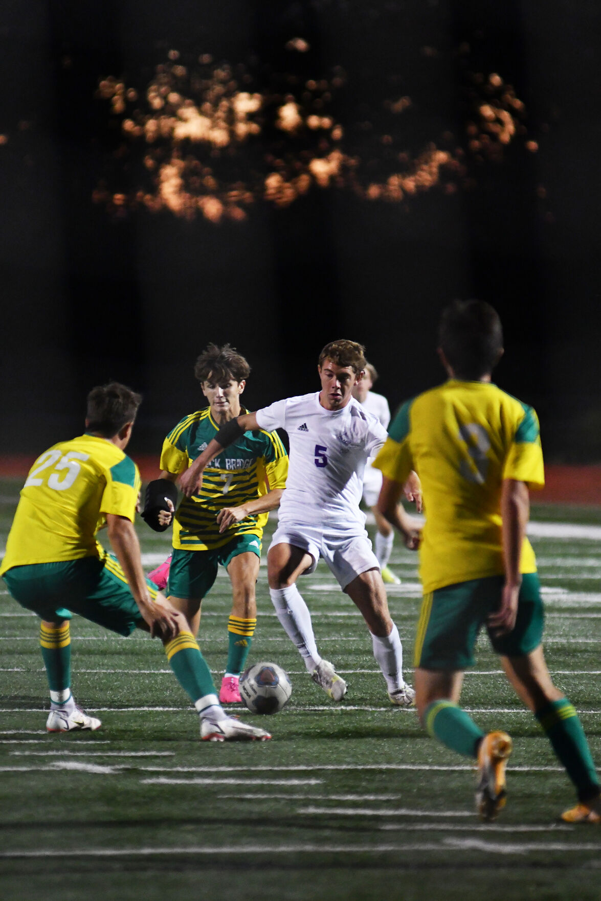 Hickman senior Luke Telle drives the ball down